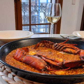 ARROZ MELOSO CON BOGAVANTE, RAPE Y AJETES con Caldo de Pescado y Marisco Paellíssimo - Paellissimo